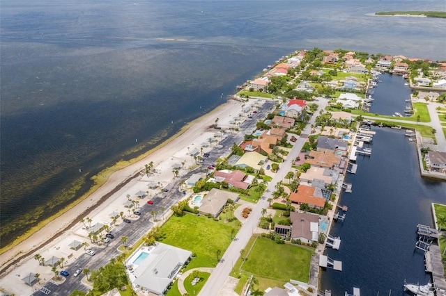 5045 Pelican Dr, New Port Richey, FL 34652 - aerial overview of property's location featuring a large body of water and nearby suburban area