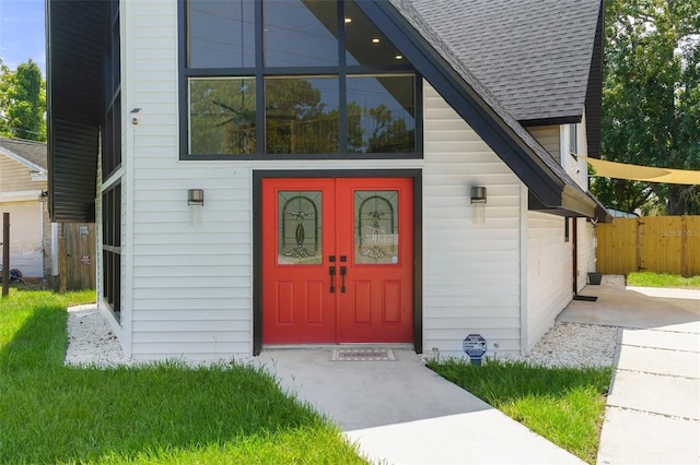 7422 New York Ave, Hudson, FL 34667 - property entrance featuring roof with shingles