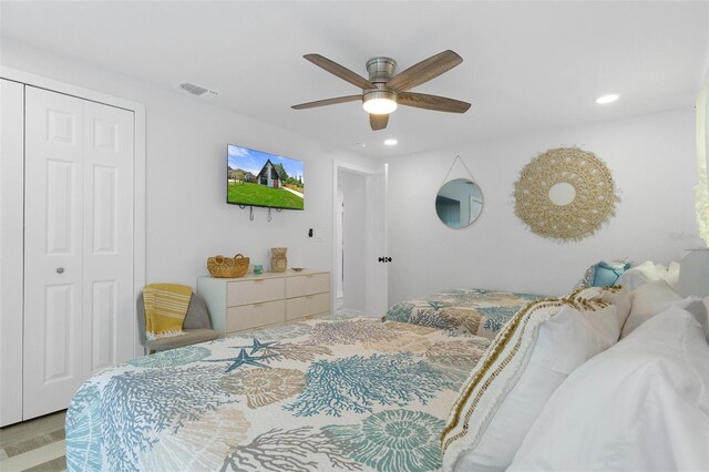 7422 New York Ave, Hudson, FL 34667 - bedroom featuring a closet, recessed lighting, a ceiling fan, and wood finished floors