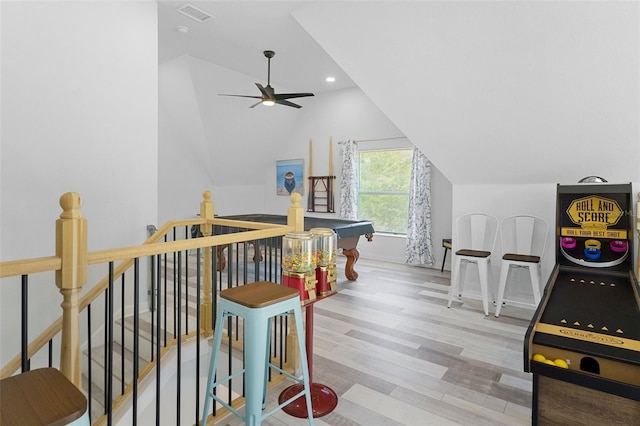 7422 New York Ave, Hudson, FL 34667 - recreation room with vaulted ceiling, ceiling fan, wood finished floors, baseboards, and billiards table