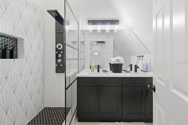 7422 New York Ave, Hudson, FL 34667 - bathroom with a stall shower, double vanity, and wallpapered walls