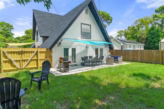 7422 New York Ave, Hudson, FL 34667 - back of house with french doors, a shingled roof, an outdoor living space, and a patio area
