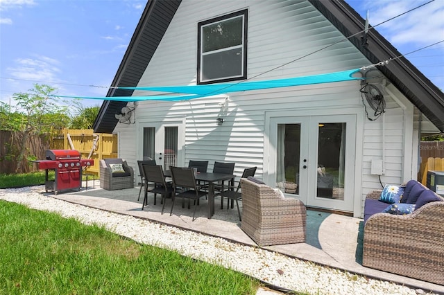 7422 New York Ave, Hudson, FL 34667 - rear view of property featuring french doors and a patio area