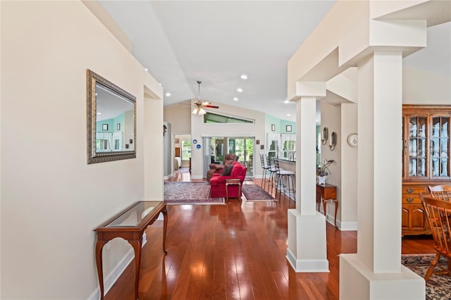 12071 Wexford Blvd, Spring Hill, FL 34609 - hallway with hardwood / wood-style flooring, vaulted ceiling, baseboards, recessed lighting, and decorative columns