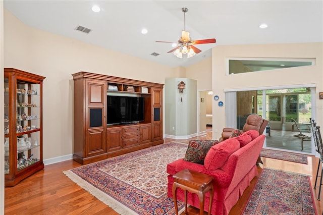 12071 Wexford Blvd, Spring Hill, FL 34609 - living room featuring light wood-type flooring, ceiling fan, baseboards, recessed lighting, and high vaulted ceiling