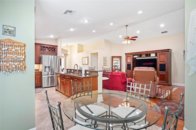 12071 Wexford Blvd, Spring Hill, FL 34609 - dining room featuring ceiling fan, baseboards, recessed lighting, and light wood-type flooring