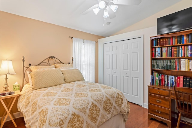 12071 Wexford Blvd, Spring Hill, FL 34609 - bedroom featuring a closet, wood finished floors, lofted ceiling, ceiling fan, and baseboards