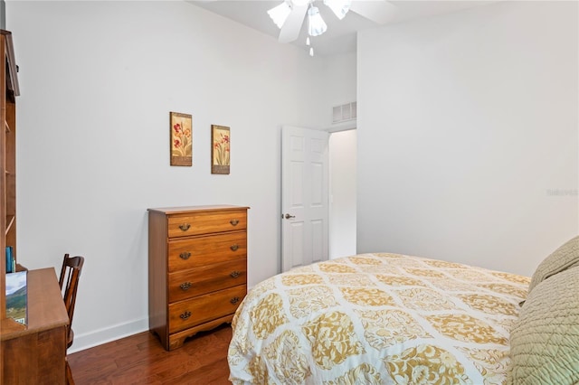 12071 Wexford Blvd, Spring Hill, FL 34609 - bedroom with dark wood-style flooring, baseboards, and ceiling fan