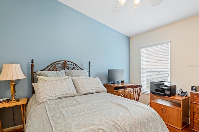 12071 Wexford Blvd, Spring Hill, FL 34609 - bedroom with vaulted ceiling, an office area, wood finished floors, and ceiling fan
