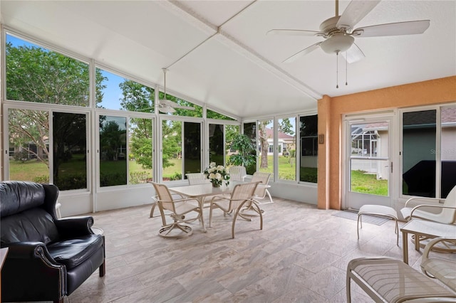 12071 Wexford Blvd, Spring Hill, FL 34609 - sunroom with lofted ceiling and stone finish flooring
