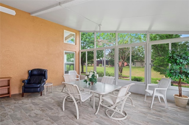 12071 Wexford Blvd, Spring Hill, FL 34609 - sunroom / solarium featuring healthy amount of natural light, a textured wall, and a high ceiling