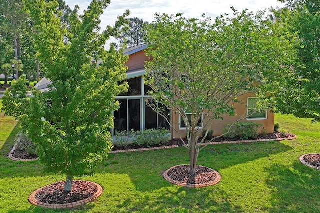 12071 Wexford Blvd, Spring Hill, FL 34609 - view of grassy yard featuring a sunroom