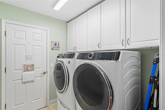 12071 Wexford Blvd, Spring Hill, FL 34609 - washroom with cabinet space and washer and clothes dryer