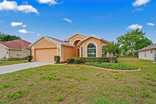 12071 Wexford Blvd, Spring Hill, FL 34609 - ranch-style home with stucco siding, an attached garage, concrete driveway, and a front yard