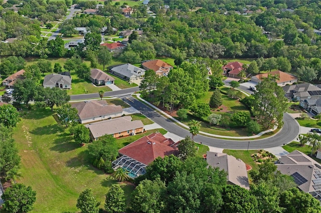 12071 Wexford Blvd, Spring Hill, FL 34609 - aerial view of property and surrounding area with nearby suburban area