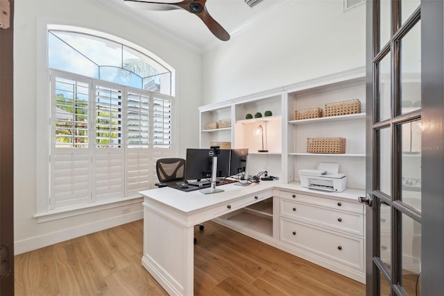 15413 Azra Dr, Odessa, FL 33556 - home office featuring crown molding, ceiling fan, and light wood-type flooring