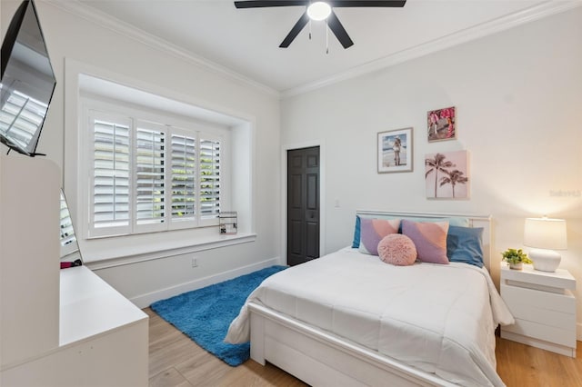 15413 Azra Dr, Odessa, FL 33556 - bedroom with ornamental molding, wood finished floors, baseboards, and a ceiling fan