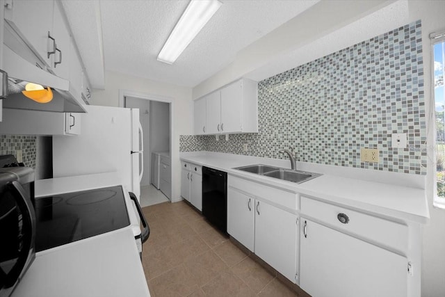 kitchen with white appliances, a sink, a textured ceiling, tasteful backsplash, and light countertops