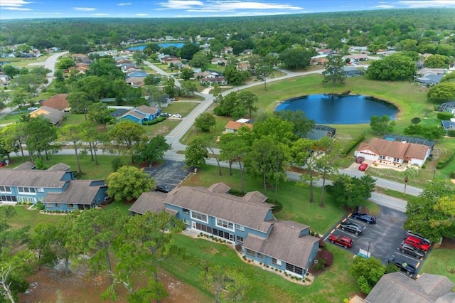aerial view of residential area with a nearby body of water
