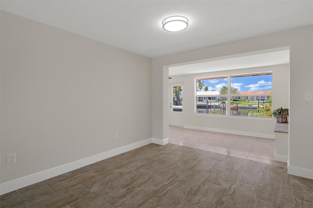 4937 Dory Dr, New Port Richey, FL 34652 - unfurnished room with baseboards