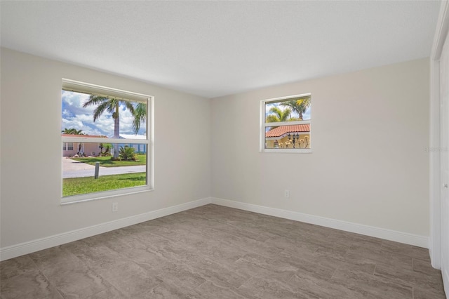 4937 Dory Dr, New Port Richey, FL 34652 - empty room with baseboards