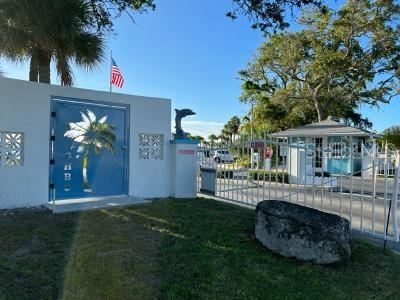 4937 Dory Dr, New Port Richey, FL 34652 - view of home's community featuring a gate