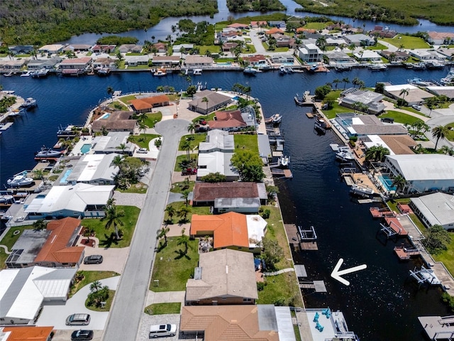 4937 Dory Dr, New Port Richey, FL 34652 - aerial view of property's location featuring a large body of water and nearby suburban area