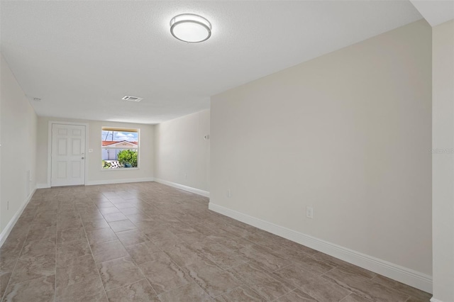 4937 Dory Dr, New Port Richey, FL 34652 - spare room with baseboards