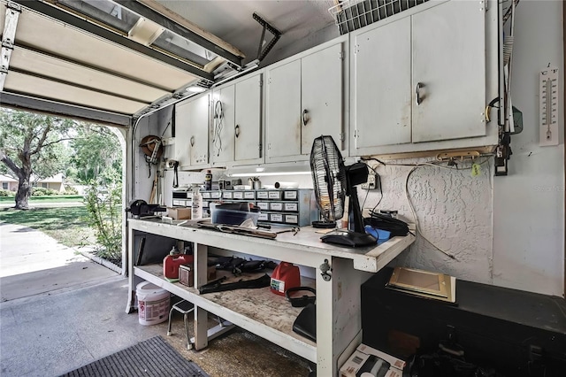 garage with a workshop area