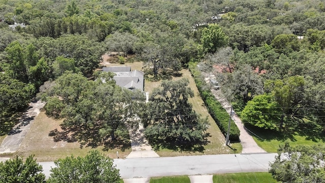 drone / aerial view of a heavily wooded area