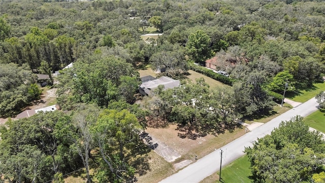 drone / aerial view of a heavily wooded area