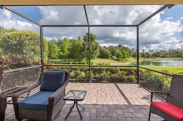 11611 Callisia Dr, Odessa, FL 33556 - sunroom / solarium with a water view and view of wooded area