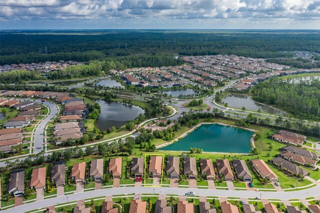 11611 Callisia Dr, Odessa, FL 33556 - view of property location with a forest, nearby suburban area, and a large body of water