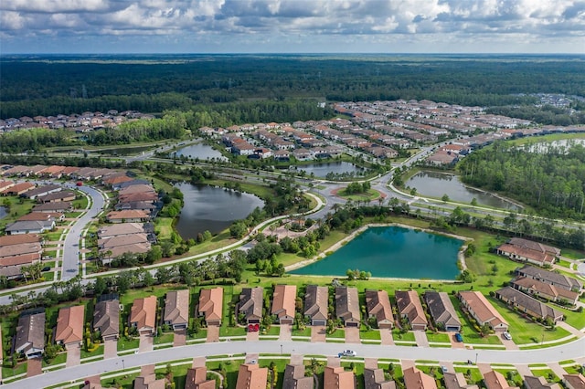 11611 Callisia Dr, Odessa, FL 33556 - view of property location with a forest, nearby suburban area, and a nearby body of water