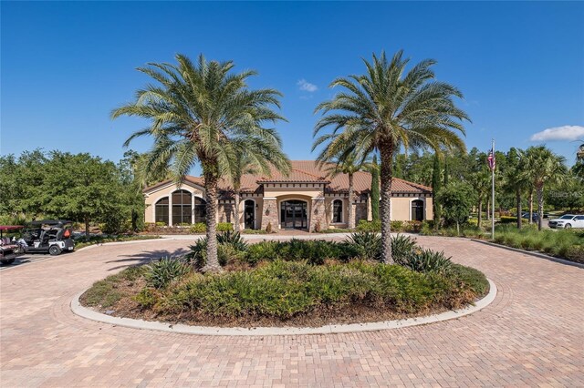 11611 Callisia Dr, Odessa, FL 33556 - view of property featuring curved driveway