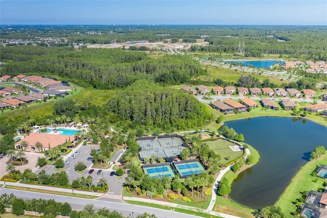 11611 Callisia Dr, Odessa, FL 33556 - aerial overview of property's location featuring a nearby body of water, a heavily wooded area, and nearby suburban area