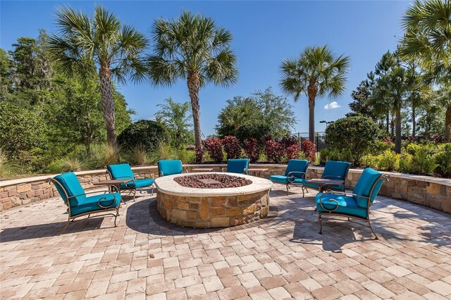 11611 Callisia Dr, Odessa, FL 33556 - view of patio / terrace featuring a fire pit