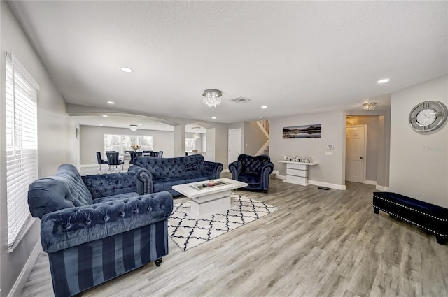6222 Cherry Blossom Trl, Gibsonton, FL 33534 - living area featuring stairs, baseboards, wood finished floors, and recessed lighting