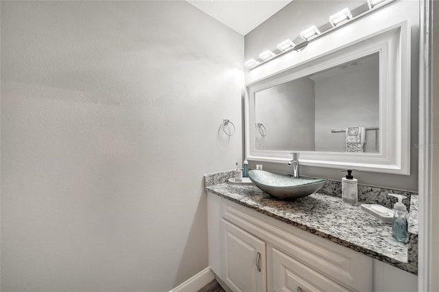 6222 Cherry Blossom Trl, Gibsonton, FL 33534 - bathroom with vanity and baseboards