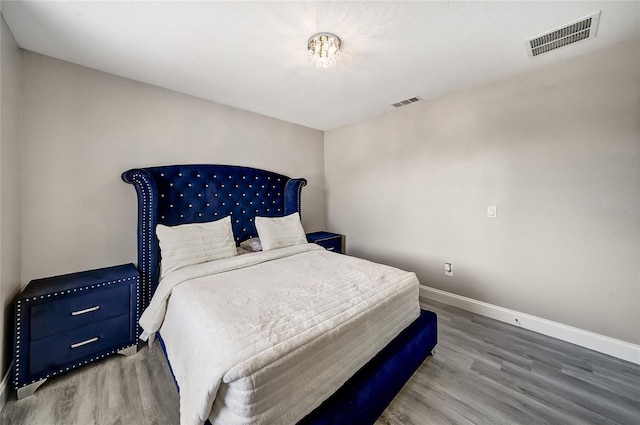 6222 Cherry Blossom Trl, Gibsonton, FL 33534 - bedroom featuring wood finished floors and baseboards