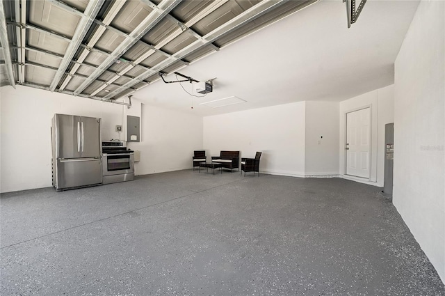 6222 Cherry Blossom Trl, Gibsonton, FL 33534 - garage featuring freestanding refrigerator, electric panel, and a garage door opener