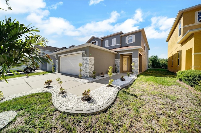 6222 Cherry Blossom Trl, Gibsonton, FL 33534 - view of front of home with stone siding, stucco siding, an attached garage, and driveway