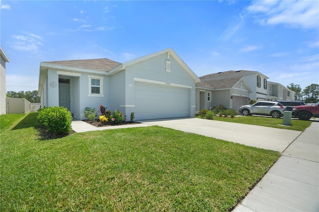 ranch-style home featuring an attached garage, stucco siding, driveway, a front lawn, and roof with shingles