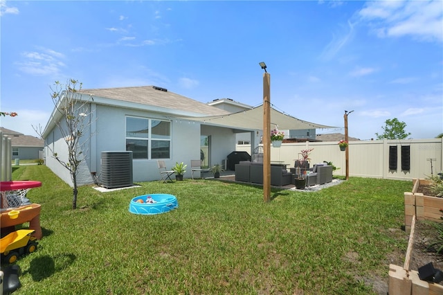 back of property featuring an outdoor hangout area, central air condition unit, and stucco siding