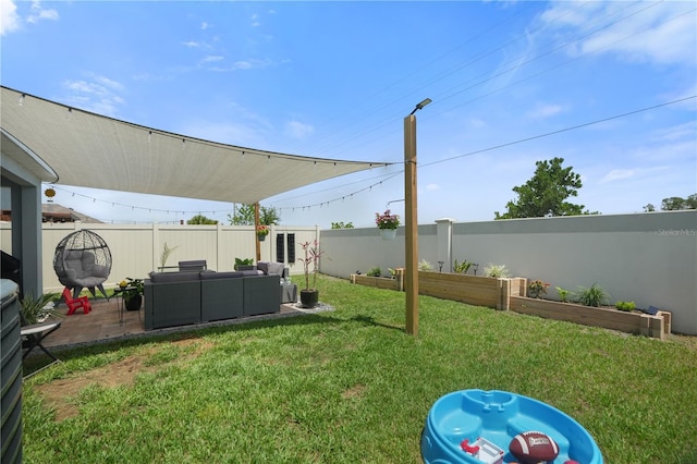 view of yard featuring outdoor lounge area and a patio