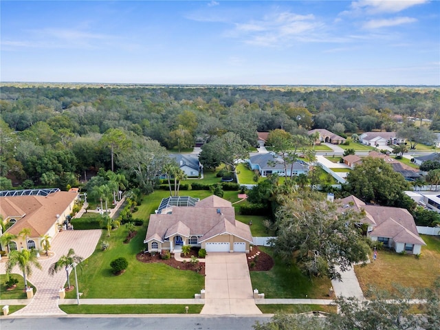 aerial view of residential area with a forest