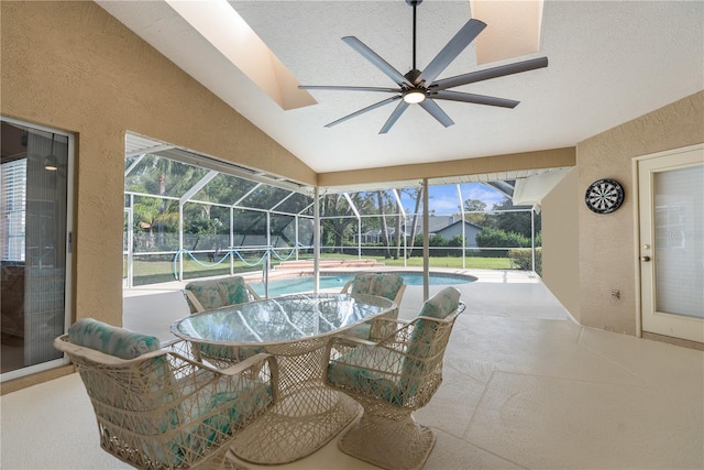 view of patio with a ceiling fan, a lanai, an outdoor pool, and outdoor dining space