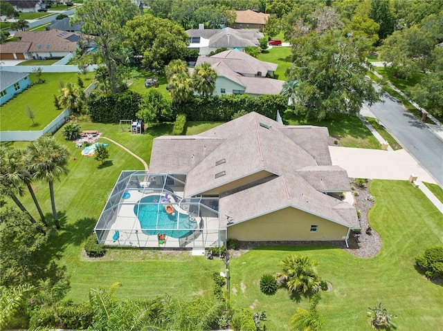 aerial view of residential area featuring a pool