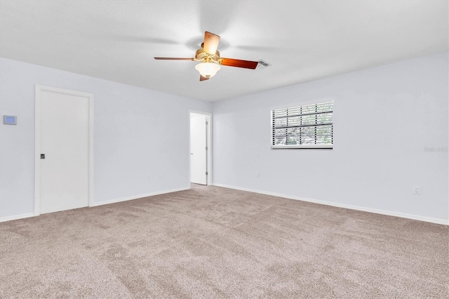 6454 Summerfield Loop, New Port Richey, FL 34655 - carpeted spare room with ceiling fan and baseboards