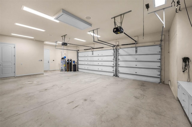 9933 Milano Dr, Trinity, FL 34655 - garage with water heater and a garage door opener